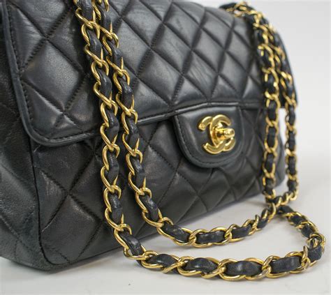 black chanel purse gold chain|chanel black handbag chain strap.